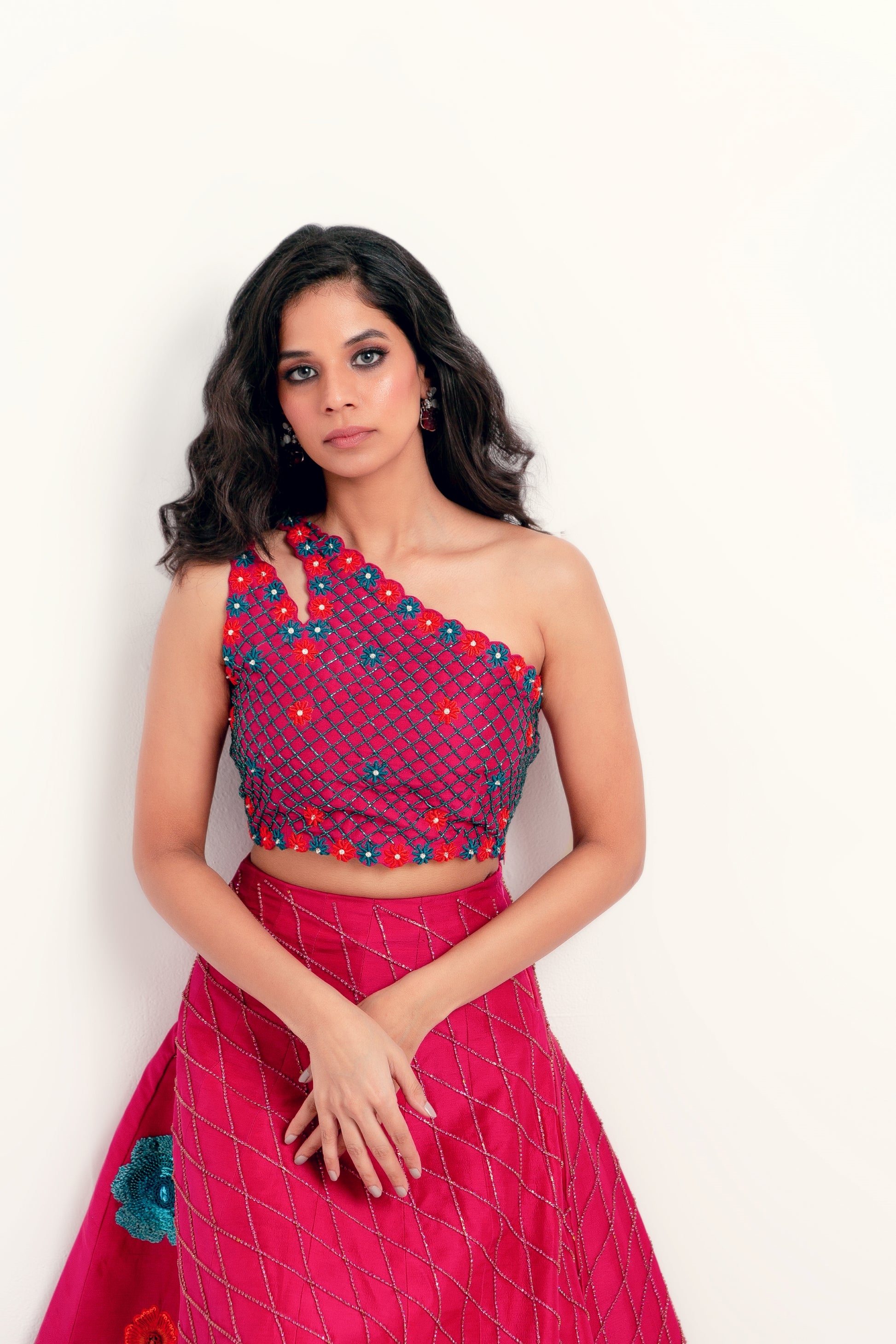 Contemporary designer lehnga with asymmetrical off-shoulder blouse