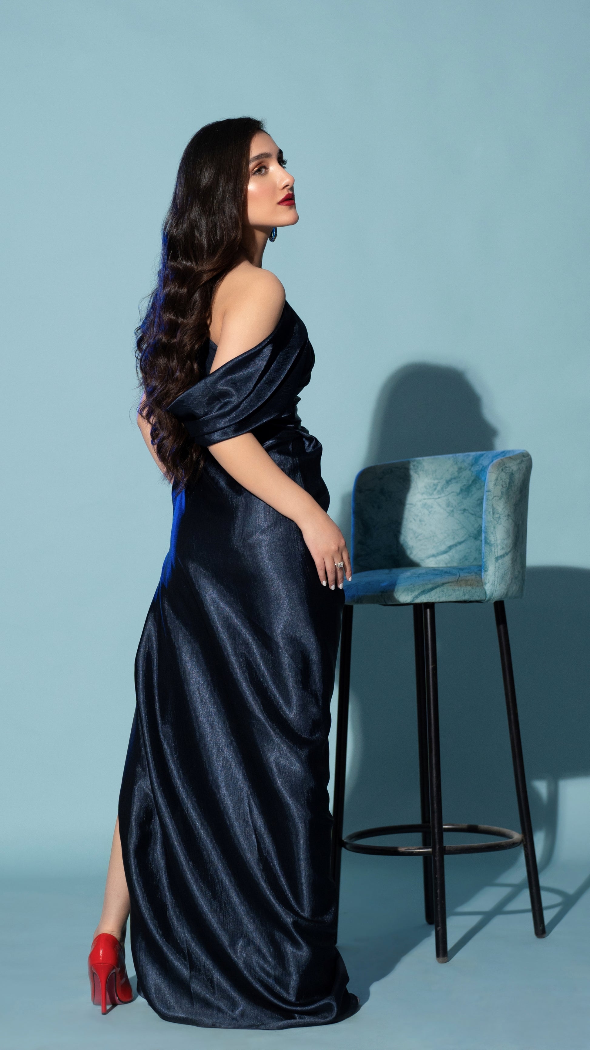 Draped silhouette designer dress for statement evening looks