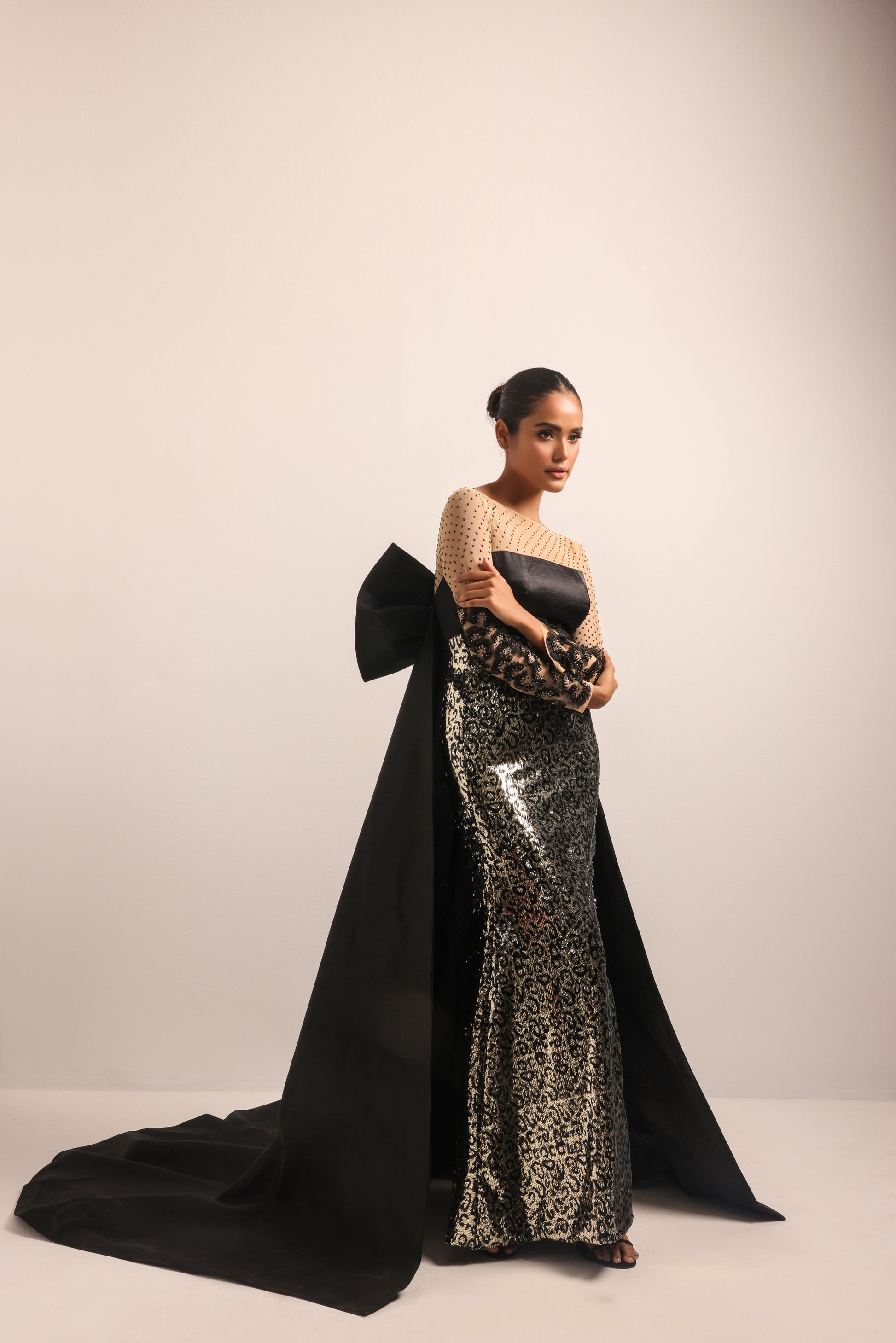 CIA gown with intricate embellishments and graceful silhouette