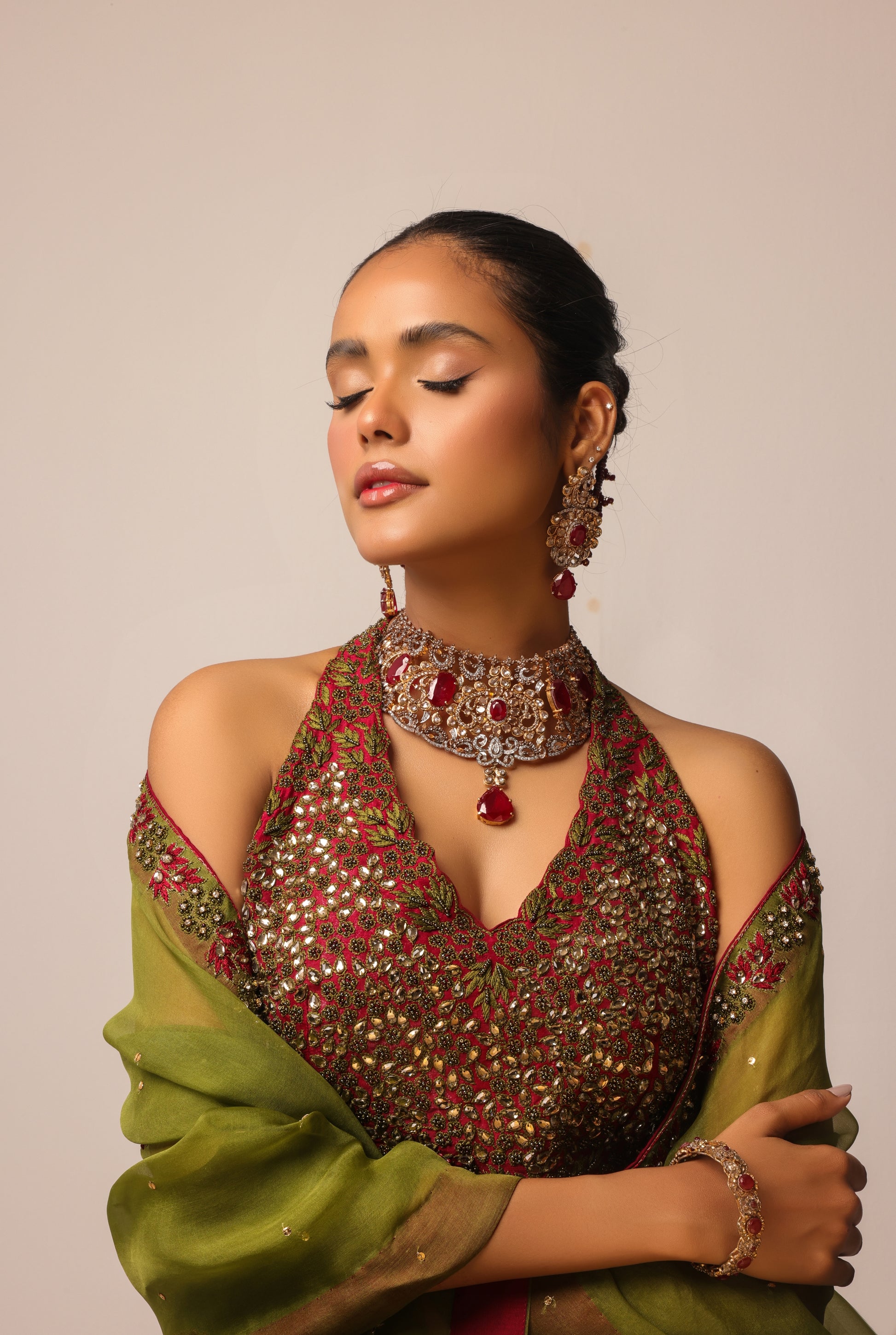 Embellished halter neck blouse with intricate embroidery and delicate beadwork