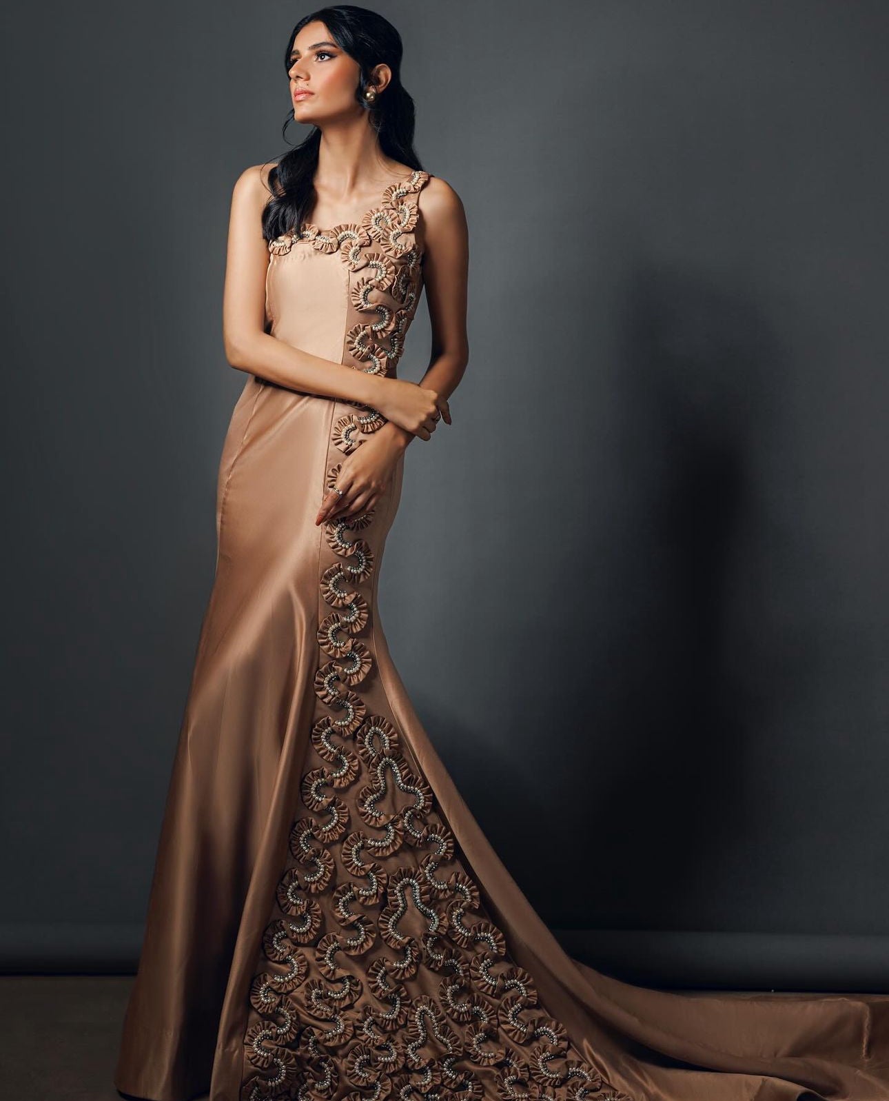 Gleaming luxury silk gown with pearl embellishments