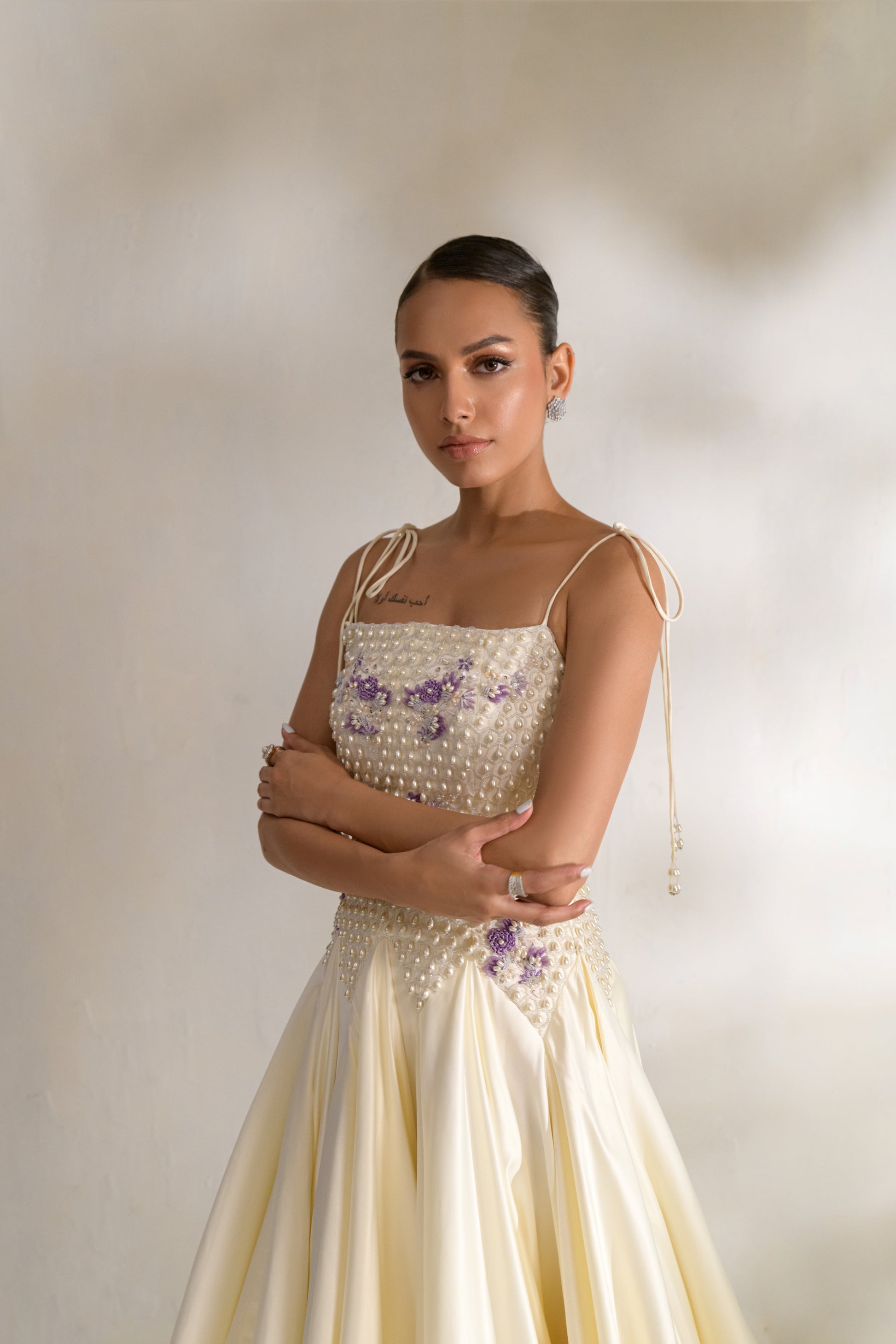 Structured silk bodice with hand-embroidered embellishments