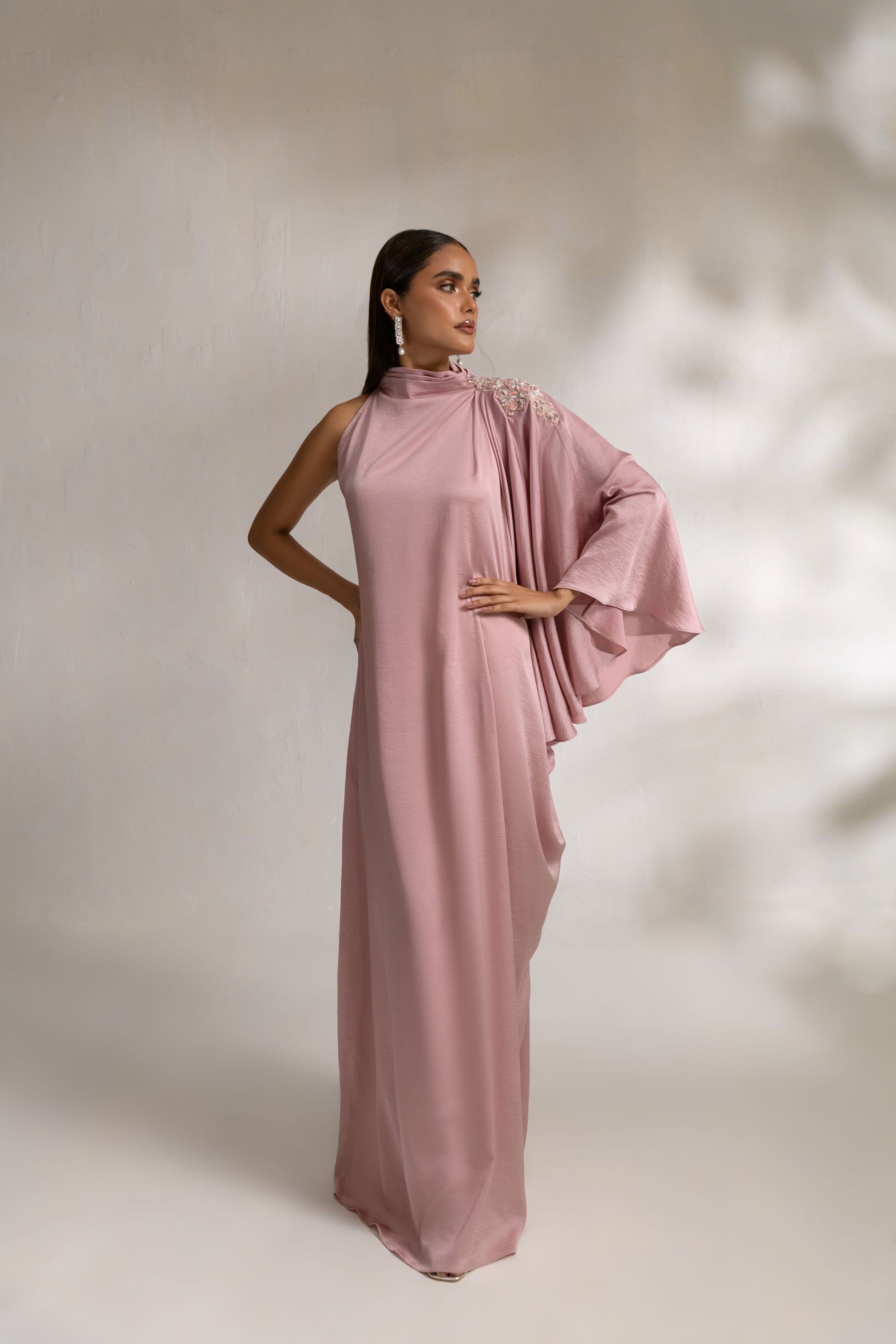 Designer kaftan with lace-embellished drape and flowing silhouette