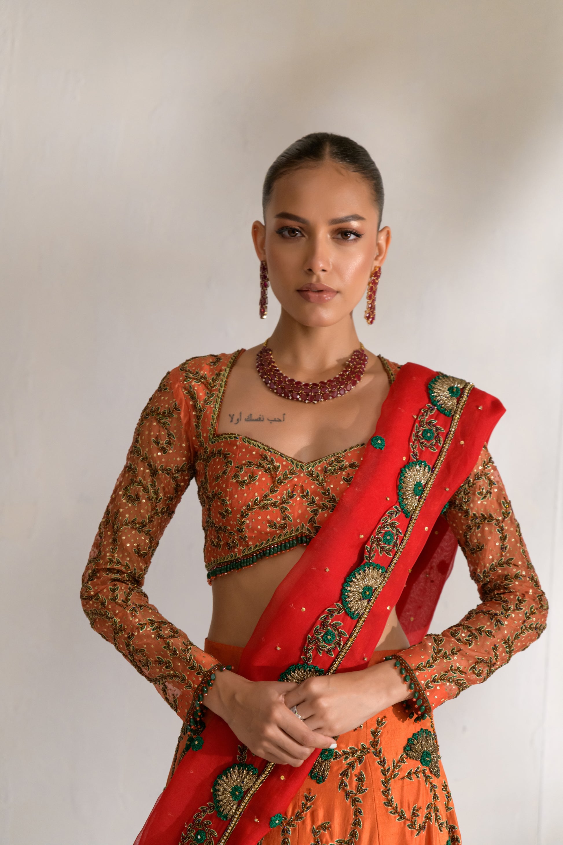 Sheer red dupatta with delicate sequin and bead embellishments