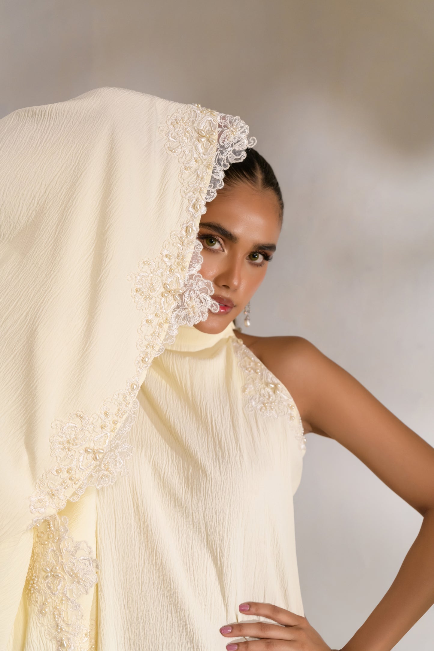 Structured draping detail on silk kaftan dress