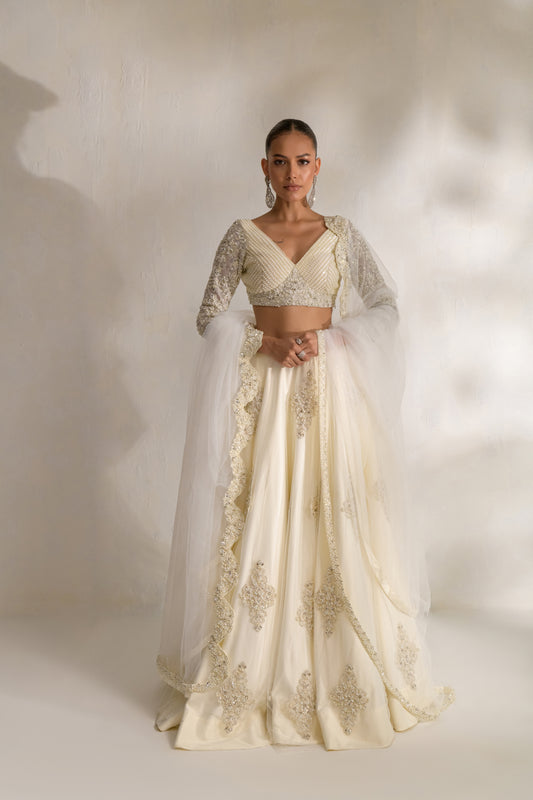 White designer lehnga choli with marori threadwork and silver sequins